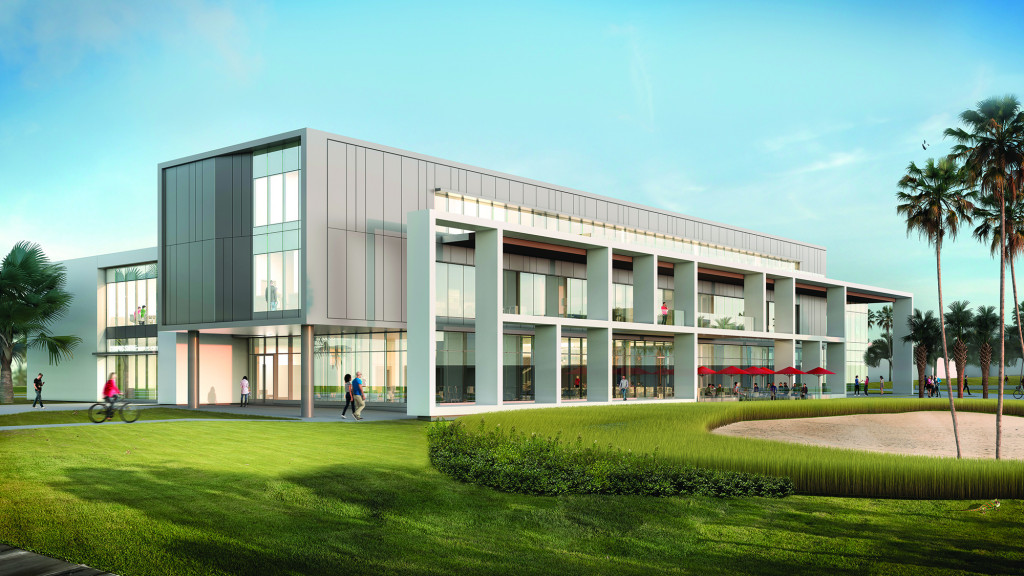 A building with a lawn and trees.